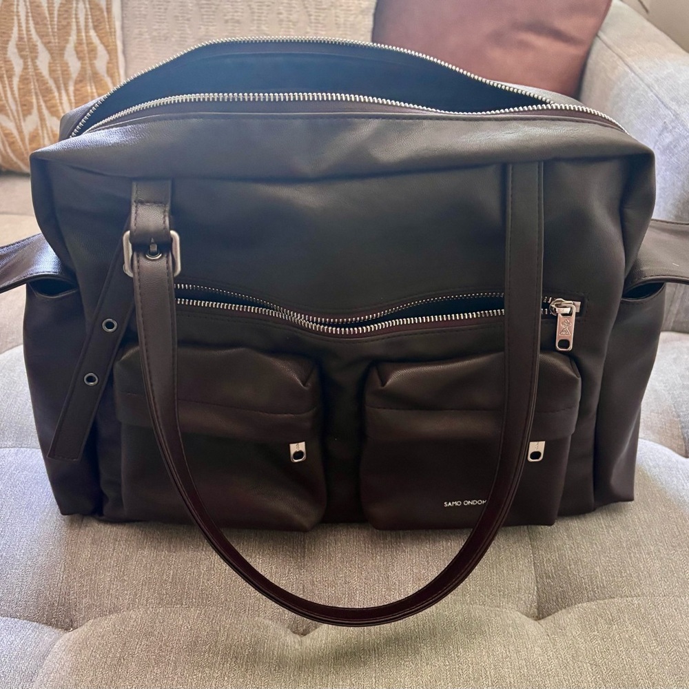 Samo Ondoh chocolate brown L utility bag.
